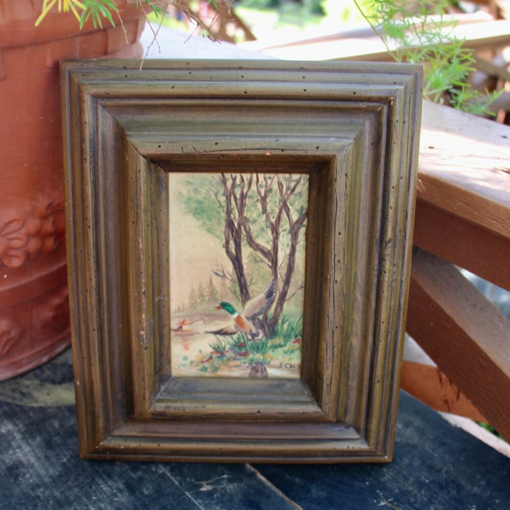 Vintage painting of ducks framed in Wooden frame
